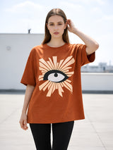 Clobug Women Rust Orange Oversized Graphic T-Shirt – Abstract Eye Print