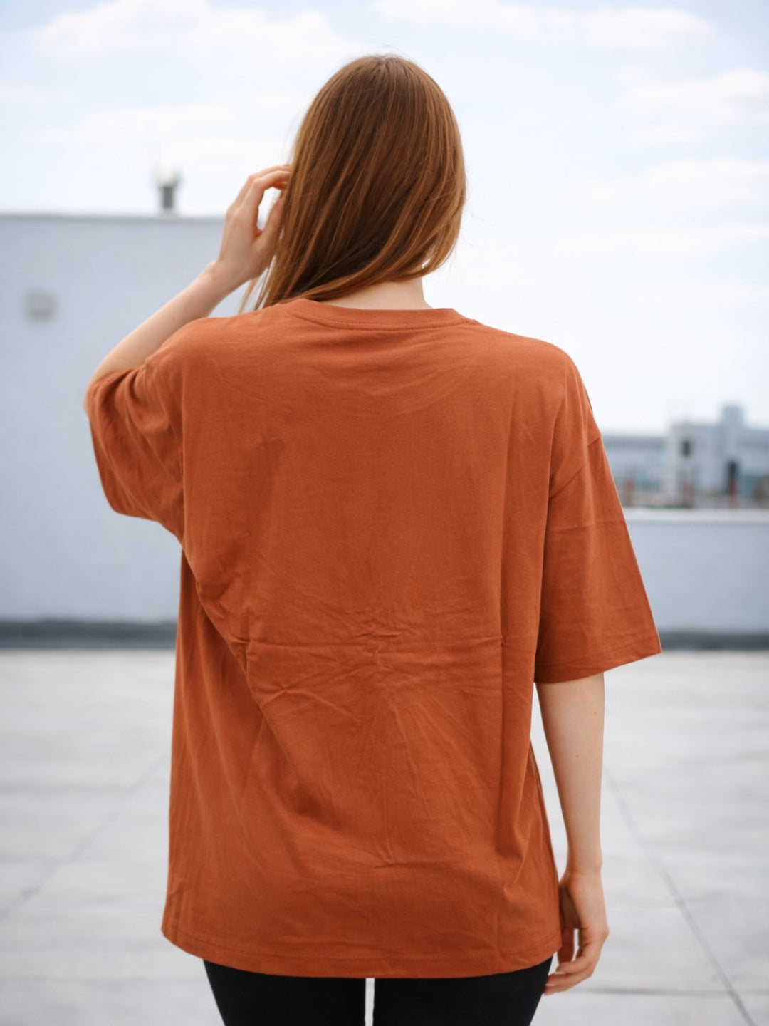 Clobug Women Rust Orange Oversized Graphic T-Shirt – Abstract Eye Print