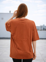 Clobug Women Rust Orange Oversized Graphic T-Shirt – Abstract Eye Print